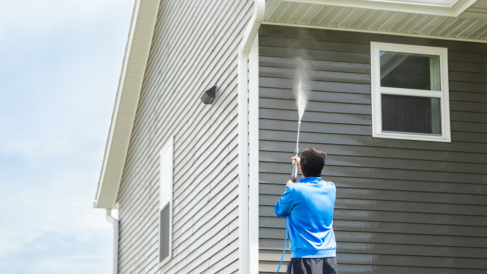 Soft-wash detail on house siding